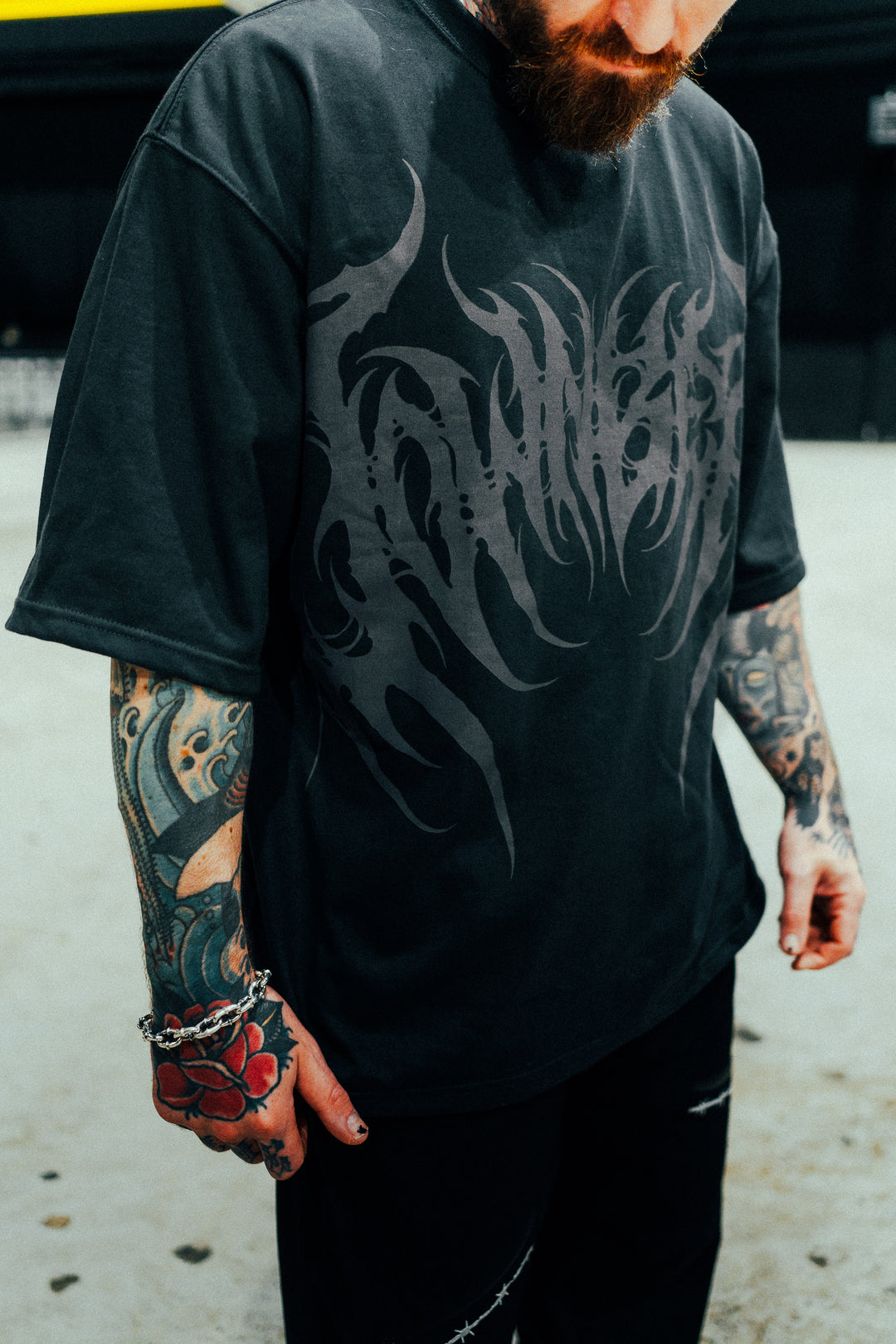 NONE HEAVIER TEE